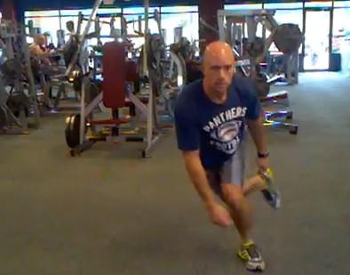 dumbbell up to chest height. Move at a quick pace.