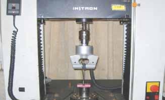 Thomas Modified Three - oint Bending A modified three point bending test enumerated by Wilkinson10 was carried out on various wires with an Instron 400 universal testing machine (Fig:3) fitted with a