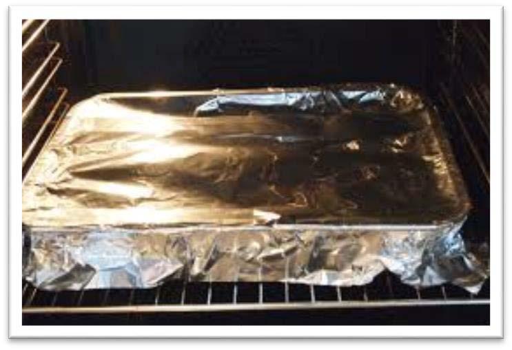 (Spread the marijuana out evenly and be sure there are no large clumps) Step 3 Next, rip off another piece of aluminum foil and wrap it over the
