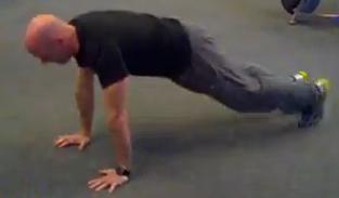 Raise your body in a straight line so that your body hovers over the mat.