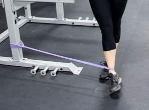 HIP ADDUCTION: Anchor the band to a stationary object. Secure the other end of the band around your inside ankle.