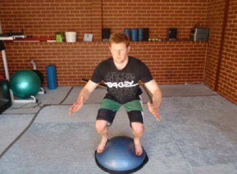 Jump off both feet and land evenly on the BOSU making sure your absorb the landing into a squat position, maintaining good posture and a braced core.