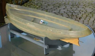 The kit also has a brass rudder assembly kit, keel guard & a 1975 black & white photo of the finished boat.