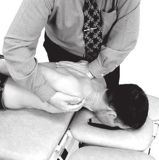The patient is then asked to relax and the examiner continues the movement passively to the end of range where an extra pressure is given to assess end-feel (Fig. 3b).
