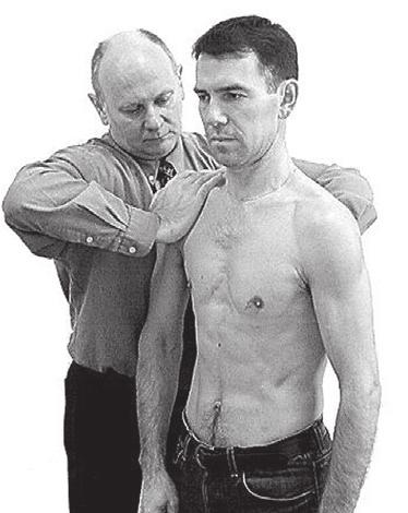 Resisted depression of the shoulder The patient bends the