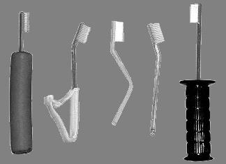 DISCUSSIONS AND CONCLUSIONS Figure 17. Modified tooth brushes. Both cases of spastic tetraparesis with different severity present the typical CP general and oral features.
