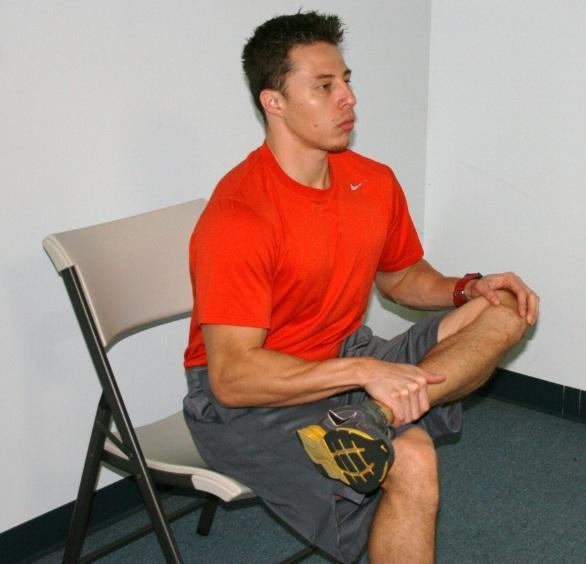 2 that reduces tension on the hamstring. For extremely tight individuals, this leg can be bent at the knee so that the foot rests flat on the ground.