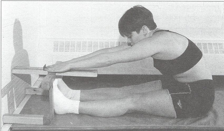 Standard Trunk Flexion (picture below) Remove your shoes for the test.