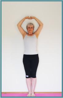 Press your thighs back and move your tailbone forwards until your top thighs and hips feel very firm. Lift your chest your head may go back slightly and roll your shoulders back and down.