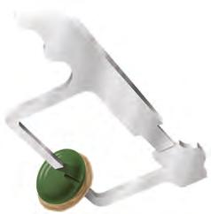Template 6 Place the appropriate drill guide on the patellar reamer guide and clamp the guide to