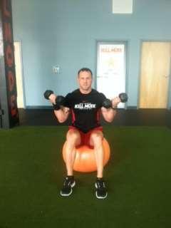 Seated Stability Ball Bicep Curls 1.