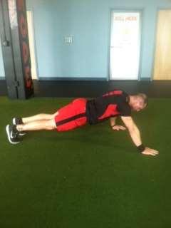 elbow, perform a push-up, and then taking a step back with your right hand and then bringing your right knee toward