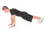 E2 Shoulder Stabilizers - Lie on the floor on your stomach. Pull your shoulder blades back and extend arms to the side. Point thumbs up and towards the ceiling.