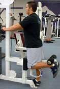 Main Muscle Worked: Hamstrings Equipment: Machine Tips: Using a standing leg curl machine, keep your body erect at all times and do not bend over.