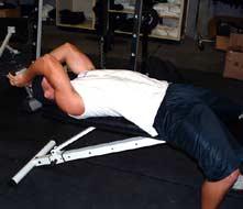 Lying Dumbbell Tricep Extension Main Muscle Worked: Triceps Equipment: Dumbbell Tips: Lay down on a flat bench with your head at the very end of the bench.