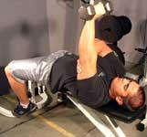 any pain. Hold one dumbbell at arms length above your chest area. Your arm should be perpendicular to the floor. The palm of your hand that is holding the dumbbell should be facing toward your feet.