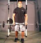 With your hands shoulder-width apart, grip a barbell with an underhand grip.