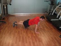 Push-up Keep the abs braced and body in a straight line from toes/knees to shoulders.