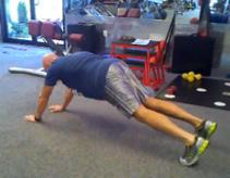 Once you get a stretch, walk your hands out until you are in a modified pushup.