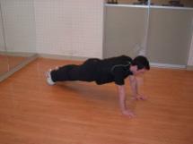 Cross Body Mountain Climber Brace your abs. Start in the top of the push-up position. Keep your abs braced, pick one foot up off the floor, and slowly bring your knee up to your opposite shoulder.