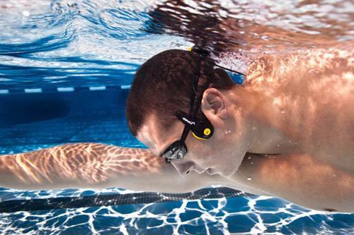 Audio Enabled Swimming Goggles: In almost every sport, music can be a rather powerful motivation to run or cycle that extra mile but never to swim that extra lap, until now.