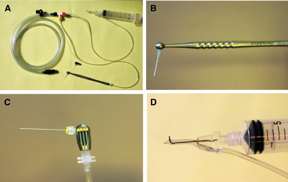 ARTICLE IN PRESS Figure 1. (A) The complete EndoVac system including all tubing and vacuum attachment. The free end of the large tubing plugs into the high speed suction of the dental chair.