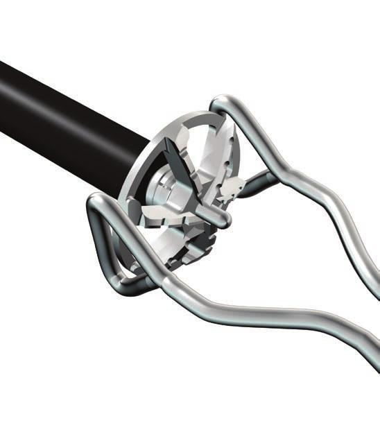 is by utilizing the Glenoid Holder instrument to grasp around the circumference of the reamer.