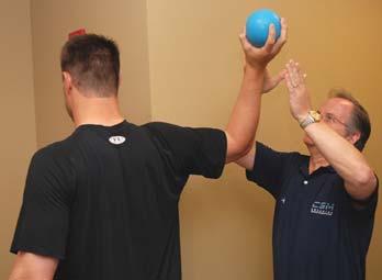 Ball throw into wall. The patient throws a 2-pound (0.9 kg) Plyoball (Functional Integrated Technologies, Watsonville, CA) against the wall at end range of external rotation (late cocking).