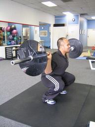 Use a foot stance that is shoulder width, and have your feet either straight or slightly externally rotated.