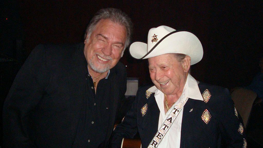 Photo Above: Gene is a huge fan of Little Jimmy Dickens and you can tell by the grin on Gene s face that Tater has just told Gene a good joke backstage at the Opry!