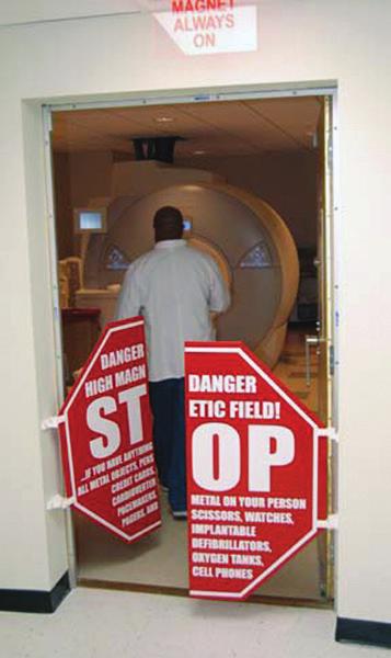 Diagrams and Inserts MRI Safety Split, Swinging Stop Sign Mounts separately from the door.