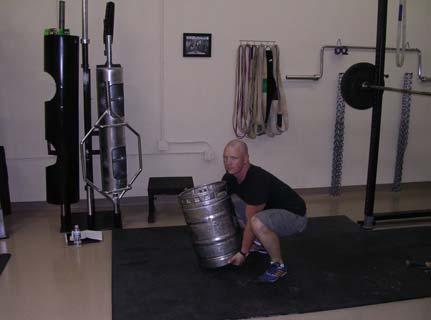 Kegs Just as with the sandbag drills, the primary goal is to develop and transfer force from out of the power position. As with the sandbags, the initial drill for the keg is shouldering. 1.