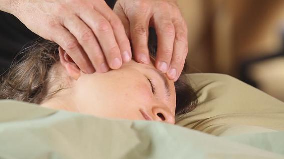 Stabilize the head of the client as you do a scalp work on the skull and the occiput region.