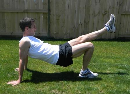 Target area: Triceps (back of arms), Abs One-legged Floor Dip 1.