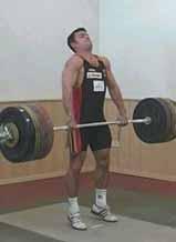 toes below the barbell arms extended view straight ahead (head