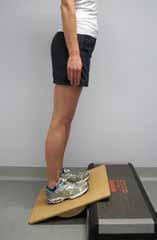1b. Alternate Gastrocnemius stretch. This stretch is a safer option for a similar stretch off the edge of the step. You can incorporate it into your daily schedule/chores i.