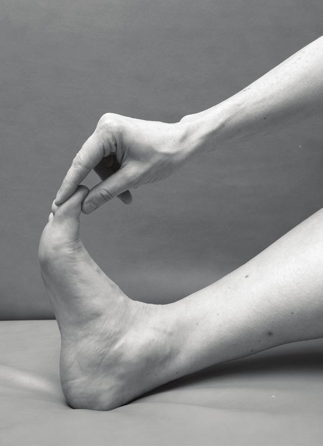 Hold the end of your toe and slowly bend the toe upwards