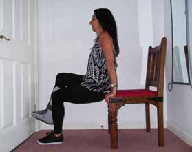 Reach your arms up onto the chair; bend the non affected knee as much as