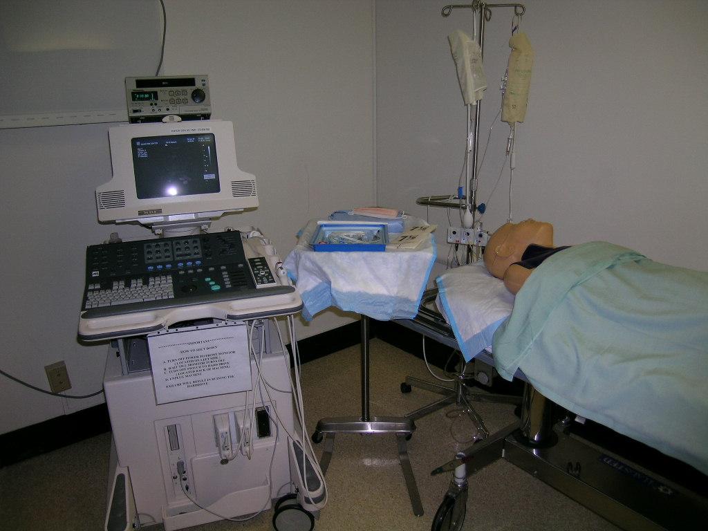 USimulation Setup: Simulators to be used: Blue Phantom Central Venous Access System SimMan Monitor only Simulator Set Up: Task trainer is placed at top of bed Sheets / blankets positioned to give the