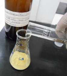 5 M sodium acetate Transfer to a 100 ml volumetric