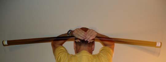 The bar is horizontal, in the positions shown. Move the hands up-and-down.