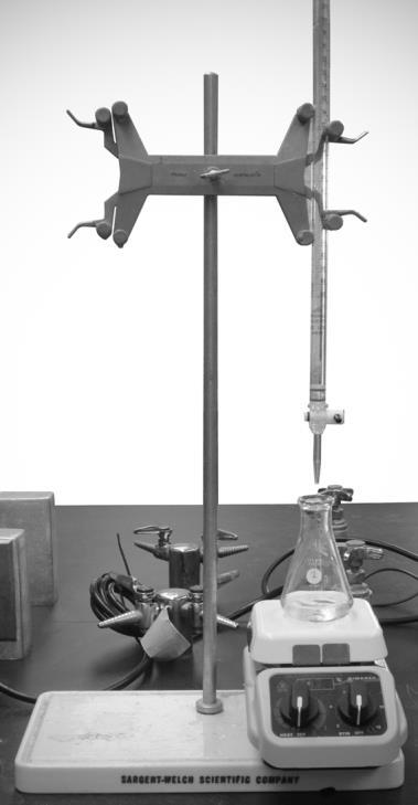 buret clamp iron stand buret with NaOH solution 125-mL Erlenmeyer flask with acid solution, indicator and stir bar stir plate Figure 2. Titration Set-up 4.