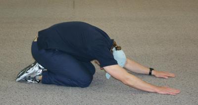 Lat dorsi/ Rhomboids -Prayer stretch - (2 x 15 second hold) Description: Kneel down and reach
