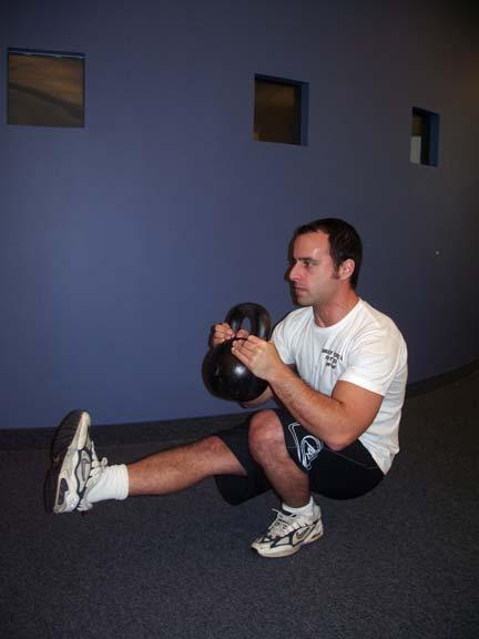 The Kettlebell will work as a counter balance and will help you get back to your feet.