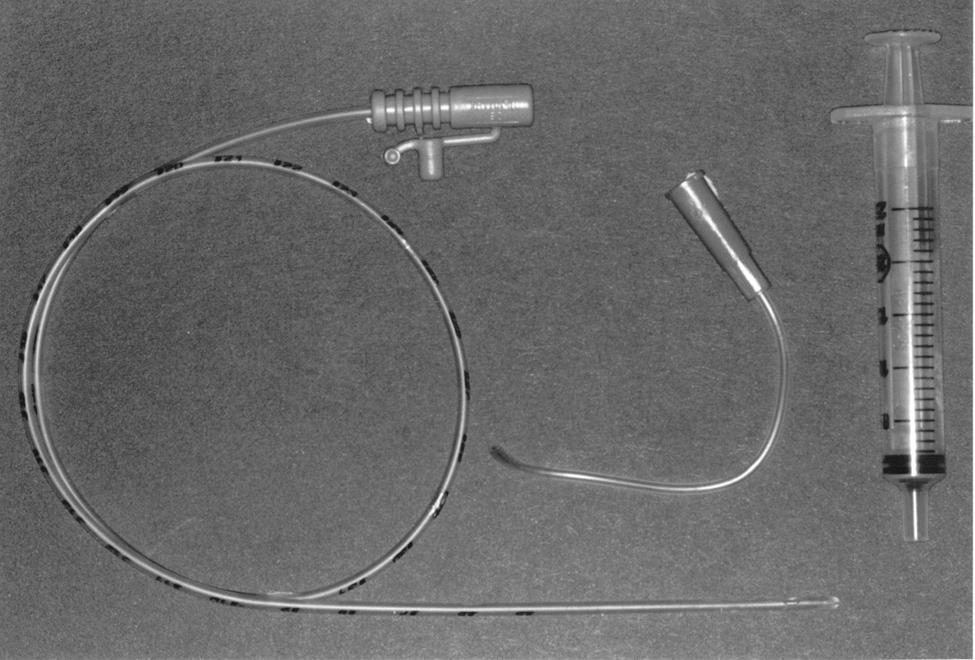 420 M. Scheepers et al. Fig. 1: Original administration devices: 2 ml syringe, neonatal feeding tube and butterfly needle tubing with the needle removed. Fig. 2: Pasteur pipette (1 ml) with midazolam vial (2 ml).