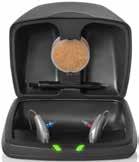 Preparation Preparation Charging Your Hearing Aids Place your hearing aids in the charger with the earbud resting inside the case Your hearing aids will turn off automatically and begin to charge