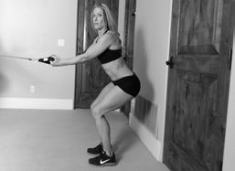 ) Attach a door anchor above your head. 2.) Stand 3-4 feet away from the door, facing the door with the knees bent and the body bent over at about a 45 degree angle. 3.) Reach forward and grab ahold of the resistance band keeping the elbows relatively straight.