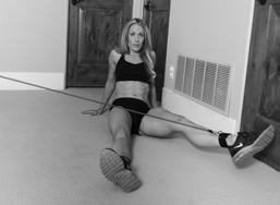 LEG ABDUCTOR (SEATED) LEG EXERCISES 1.) Attach the door anchor at the bottom of the door. 2.