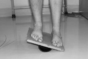 Push your ankle outward against the resistance of the band. Hold and slowly return.