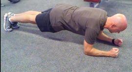 Warm-Up Plank Lie on your stomach on a mat.